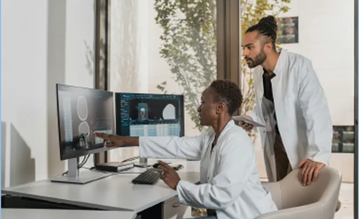 Healthcare professionals reviewing clinical imagery